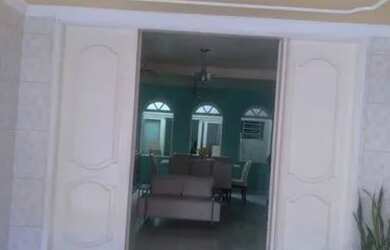 Imagem: A casa possui 2 Dormitórios, 3 Banheiros, 2 Vagas na garagem