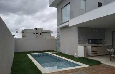 Imagem: A casa em condomínio possui 4 Dormitórios, 4 Banheiros, 2