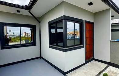 Imagem: A casa possui 2 Dormitórios, 1 Banheiro, 2 Vagas na garagem