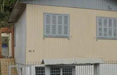 Imagem: A casa possui 3 Dormitórios, 1 Banheiro, 4 Vagas na garagem