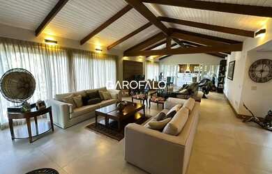 Imagem: A casa possui 5 Dormitórios, 5 Banheiros, 5 Vagas na garagem