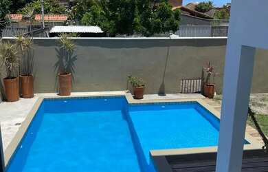 Imagem: A casa possui 3 Dormitórios, 4 Banheiros, 4 Vagas na garagem