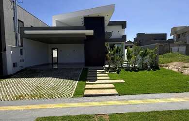 Imagem: A casa possui 3 Dormitórios, 4 Banheiros, 4 Vagas na garagem