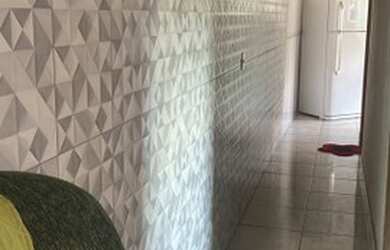 Imagem: A casa possui 3 Dormitórios, 2 Banheiros, 3 Vagas na garagem