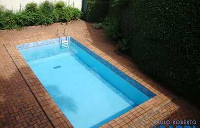 Imagem: A casa possui 4 Dormitórios, 5 Banheiros, 2 Vagas na garagem