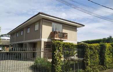 Imagem: A casa possui 3 Dormitórios, 1 Banheiro, 2 Vagas na garagem