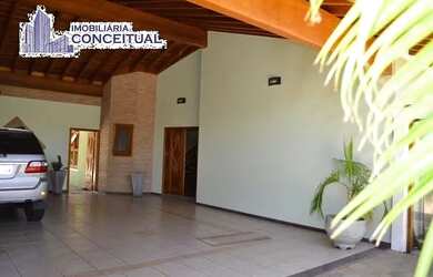 Imagem: A casa possui 4 Dormitórios, 5 Banheiros, 5 Vagas na garagem