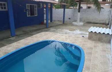 Imagem: A casa possui 2 Dormitórios, 2 Banheiros, 3 Vagas na garagem