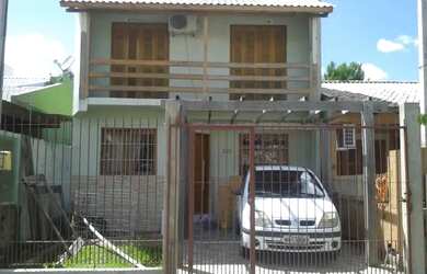 Imagem: A casa possui 3 Dormitórios, 3 Banheiros, 2 Vagas na garagem