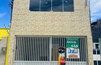 Imagem: A casa possui 4 Dormitórios, 2 Banheiros e 2 Vagas na garagem