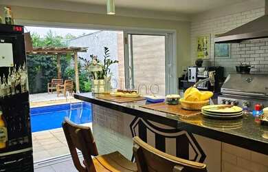 Imagem: A casa possui 3 Dormitórios, 4 Banheiros, 4 Vagas na garagem