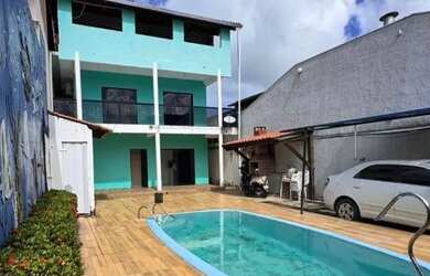 Imagem: A casa possui 5 Dormitórios, 5 Banheiros, 2 Vagas na garagem