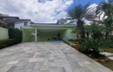 Imagem: A casa em condomínio possui 4 Dormitórios, 5 Banheiros, 4