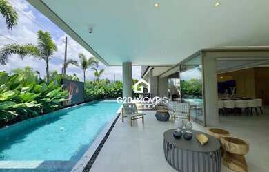 Imagem: A casa possui 5 Dormitórios, 1 Banheiro, 5 Vagas na garagem