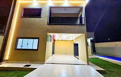 Imagem: A casa possui 3 Dormitórios, 3 Banheiros, 3 Vagas na garagem