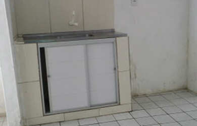 Imagem: A casa possui 3 Dormitórios e 1 Banheiro e está localizado