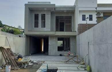 Imagem: A casa possui 3 Dormitórios, 3 Banheiros, 4 Vagas na garagem