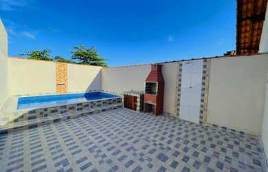 Imagem: A casa possui 2 Dormitórios, 1 Banheiro, 2 Vagas na garagem