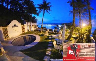 Imagem: A casa possui 5 Dormitórios, 5 Banheiros, 4 Vagas na garagem