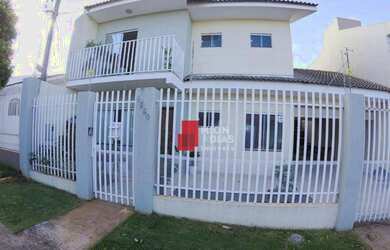 Imagem: A casa possui 3 Dormitórios, 2 Banheiros, 2 Vagas na garagem