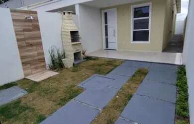 Imagem: A casa possui 2 Dormitórios, 2 Banheiros, 2 Vagas na garagem