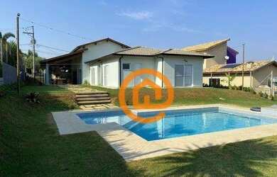 Imagem: A casa em condomínio possui 4 Dormitórios, 5 Banheiros, 5