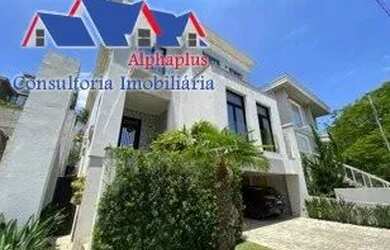 Imagem: A casa possui 4 Dormitórios, 5 Banheiros, 4 Vagas na garagem