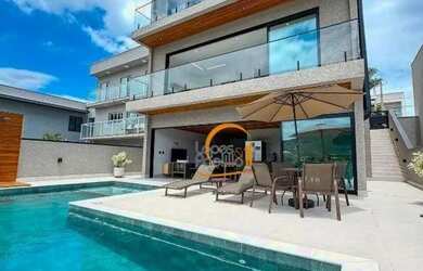 Imagem: A casa em condomínio possui 4 Dormitórios, 4 Banheiros, 2