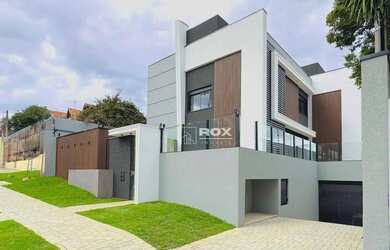 Imagem: A casa em condomínio possui 3 Dormitórios, 3 Banheiros, 3