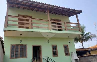 Imagem: A casa possui 2 Dormitórios, 3 Banheiros, 3 Vagas na garagem