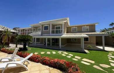 Imagem: A casa possui 5 Dormitórios, 5 Banheiros, 5 Vagas na garagem