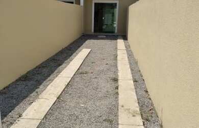 Imagem: A casa possui 2 Dormitórios, 2 Banheiros, 3 Vagas na garagem