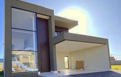 Imagem: A casa possui 3 Dormitórios, 5 Banheiros, 4 Vagas na garagem