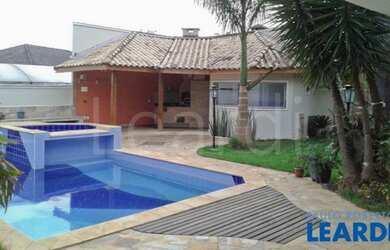 Imagem: A casa em condomínio possui 3 Dormitórios, 4 Banheiros, 5