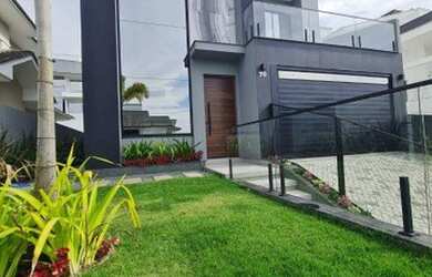 Imagem: A casa possui 3 Dormitórios, 4 Banheiros, 4 Vagas na garagem