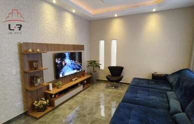 Imagem: A casa possui 3 Dormitórios, 3 Banheiros, 4 Vagas na garagem