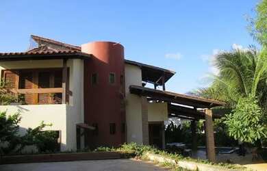 Imagem: A casa possui 5 Dormitórios, 4 Vagas na garagem e está localizado