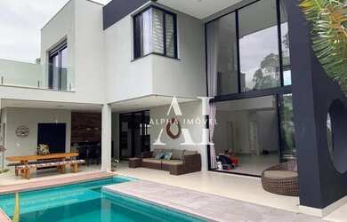 Imagem: A casa em condomínio possui 4 Dormitórios, 5 Banheiros, 3