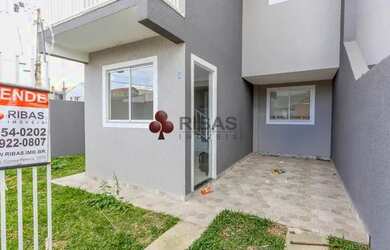 Imagem: A casa possui 2 Dormitórios, 1 Banheiro, 2 Vagas na garagem