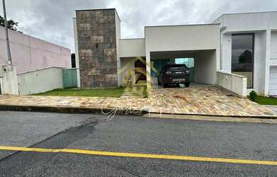 Imagem: A casa possui 4 Dormitórios, 4 Banheiros, 4 Vagas na garagem