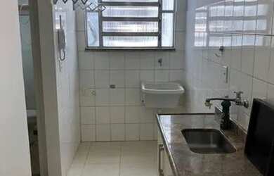 Imagem 4: Apartamento com quarto, sala, cozinha, banheiro e pequena área de serviço