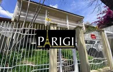 Imagem: A casa possui 3 Dormitórios, 5 Banheiros, 3 Vagas na garagem