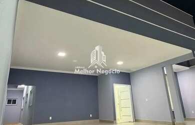 Imagem: A casa possui 3 Dormitórios, 3 Banheiros, 4 Vagas na garagem