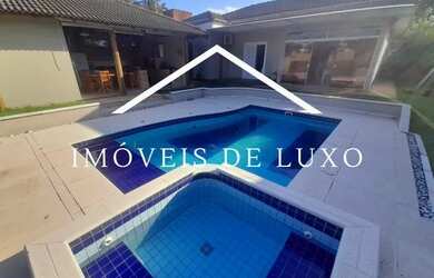 Imagem: A casa em condomínio possui 4 Dormitórios, 5 Banheiros, 2