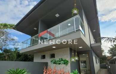 Imagem: A casa possui 2 Dormitórios, 3 Banheiros, 1 Vaga na garagem