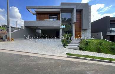 Imagem: A casa em condomínio possui 4 Dormitórios, 5 Banheiros, 5