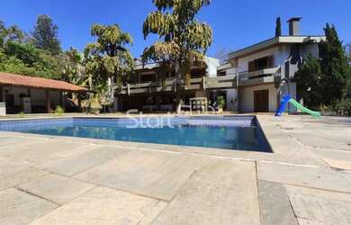 Imagem: A casa em condomínio possui 4 Dormitórios, 5 Banheiros, 5