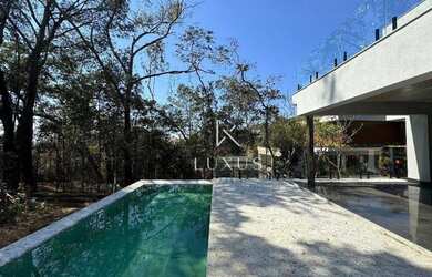 Imagem: A casa para alugar possui 4 Dormitórios, 5 Banheiros, 5 Vagas