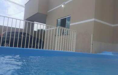 Imagem: A casa possui 3 Dormitórios, 2 Vagas na garagem, 150m² de