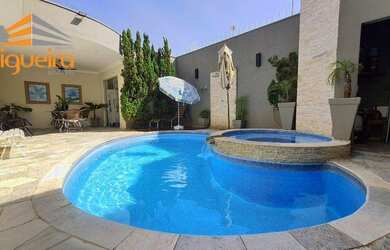 Imagem: A casa possui 3 Dormitórios, 4 Banheiros, 3 Vagas na garagem